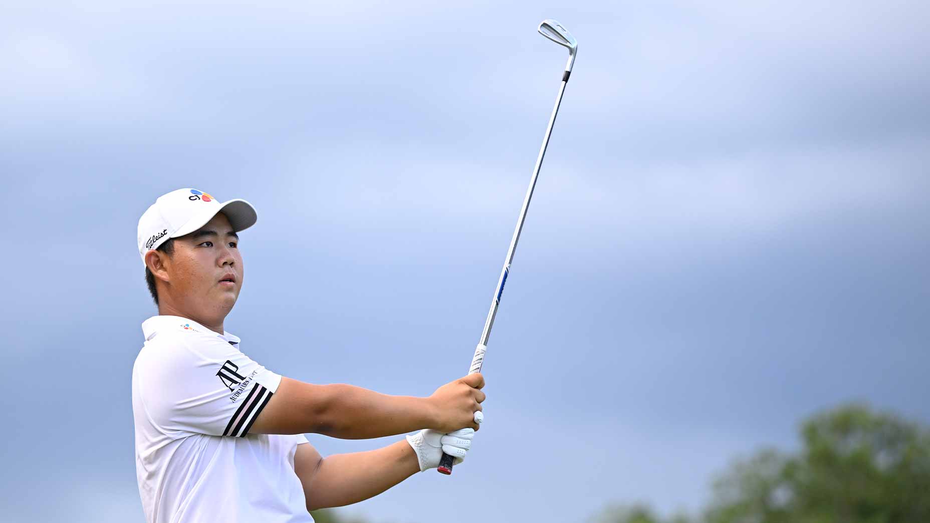 tom kim swings iron
