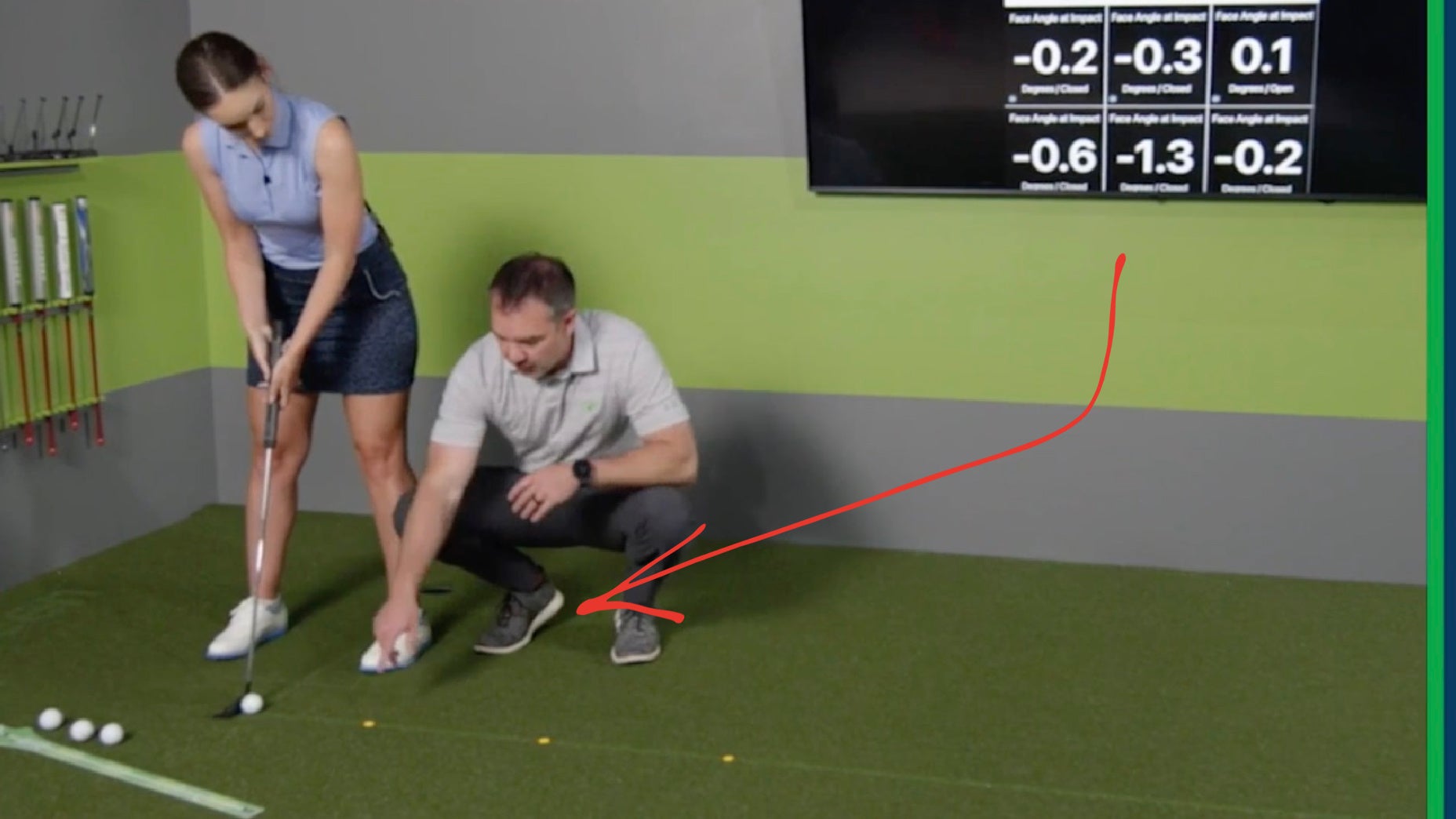 Golf instructor demonstrates putting drill
