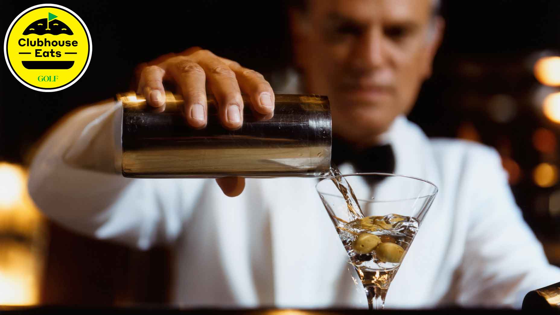 man pours martini