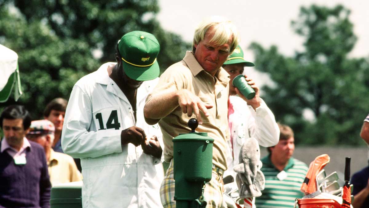 greg norman at masters with ball washer