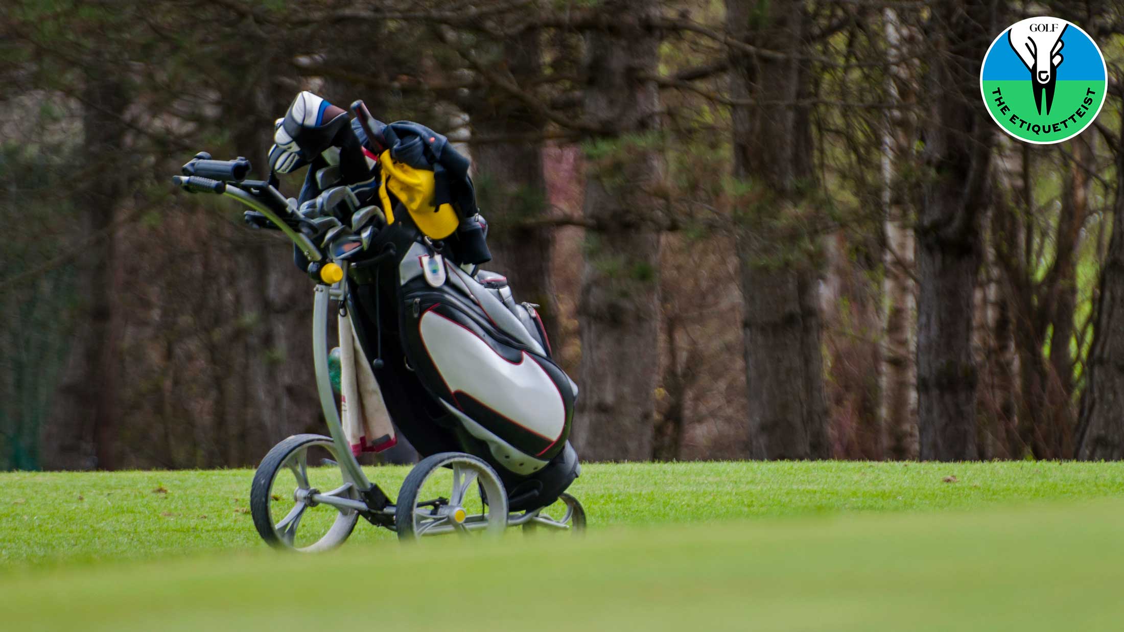 Is rolling your pushcart across a green a breach of etiquette?