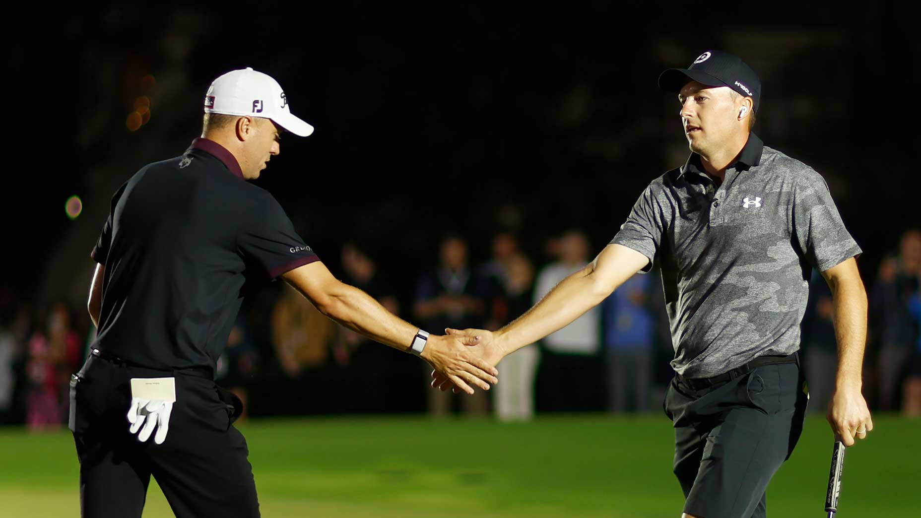 Justin Thomas of the United States and Jordan Spieth of the United States celebrate during The Match 7 at Pelican at Pelican Golf Club on December 10, 2022 in Belleair, Florida.