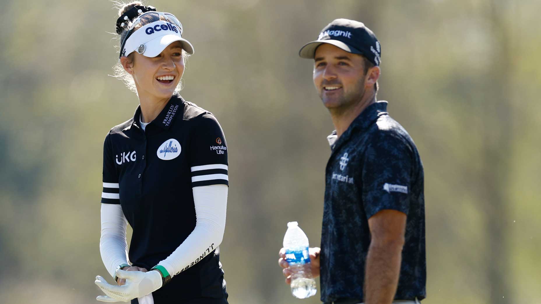 Nelly Korda and Denny McCarthy of the United States interact on the 3rd tee during round two of the QBE Shootout at Tiburon Golf Club on December 10, 2022 in Naples, Florida.