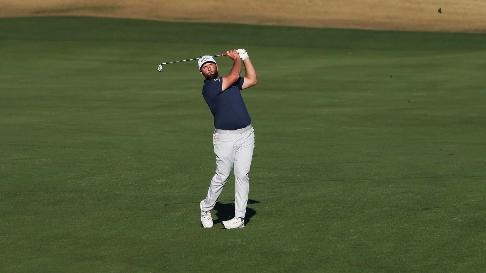 Jon Rahm watches iron shot at 2023 American Express