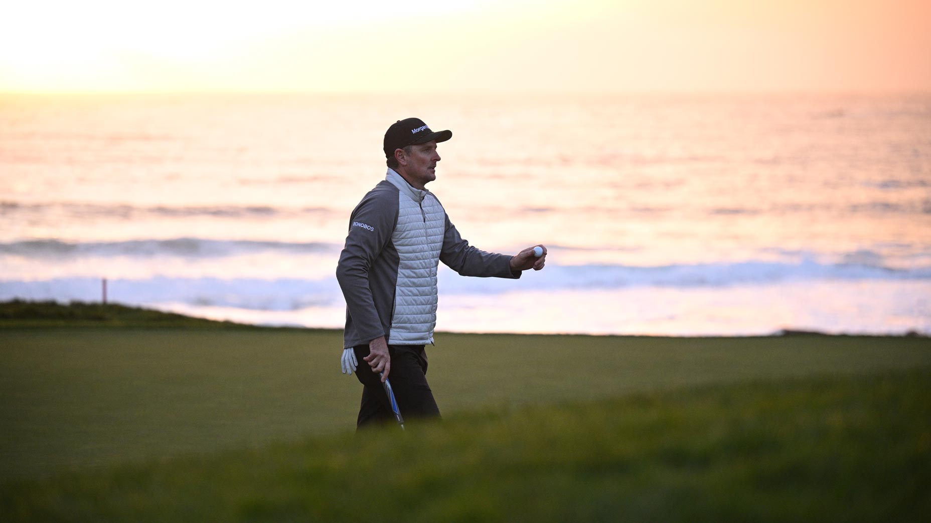 Justin Rose of England reacts to his putt on the ninth green during the final round of the AT&T Pebble Beach Pro-Am at Pebble Beach Golf Links on February 05, 2023 in Pebble Beach, California.