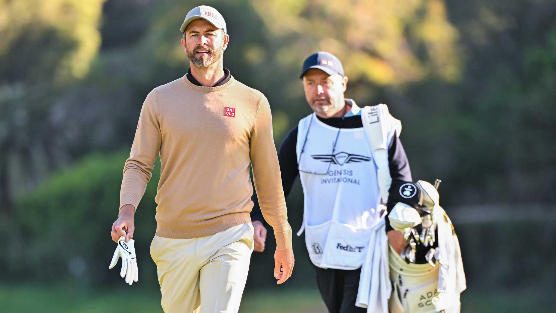 Adam Scott and caddie walk course at Genesis Invitational