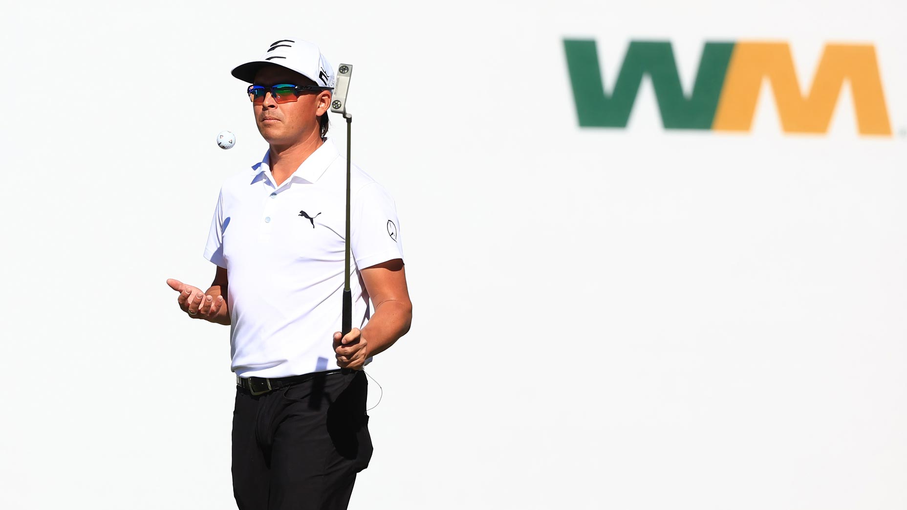 Rickie Fowler pictured with putter at 2022 WM Phoenix Open