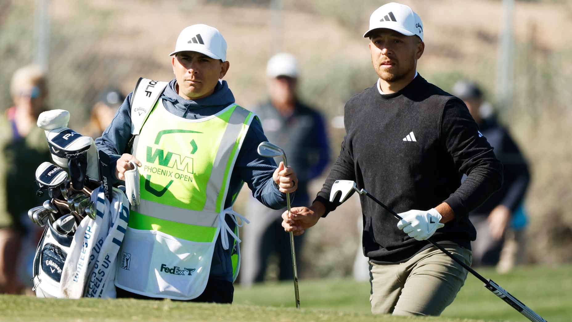 Xander Schauffele talks with caddie at 2023 WM Phoenix Open