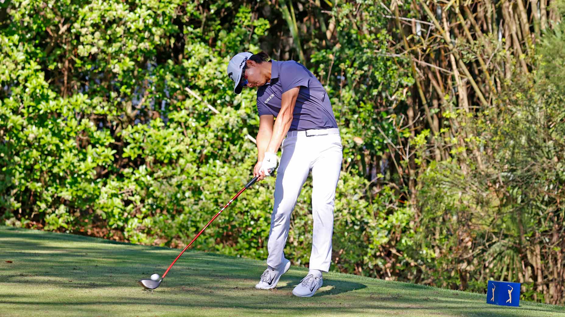 PGA golfer Min Woo Lee hits his tee shot on the 11th hole on March 11, 2023, during the third round for THE PLAYERS Championship at TPC Sawgrass in Ponte Vedra Beach, Florida.