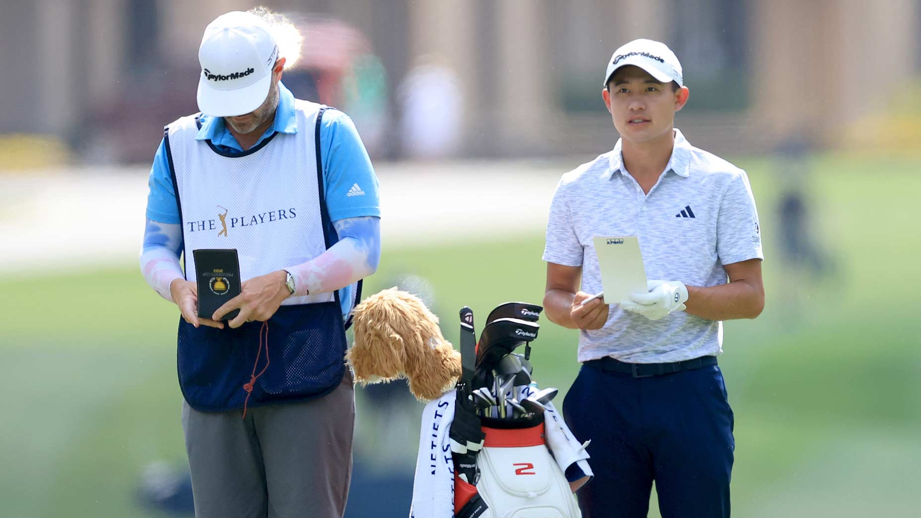 Collin Morikawa and caddie at TPC Sawgrass