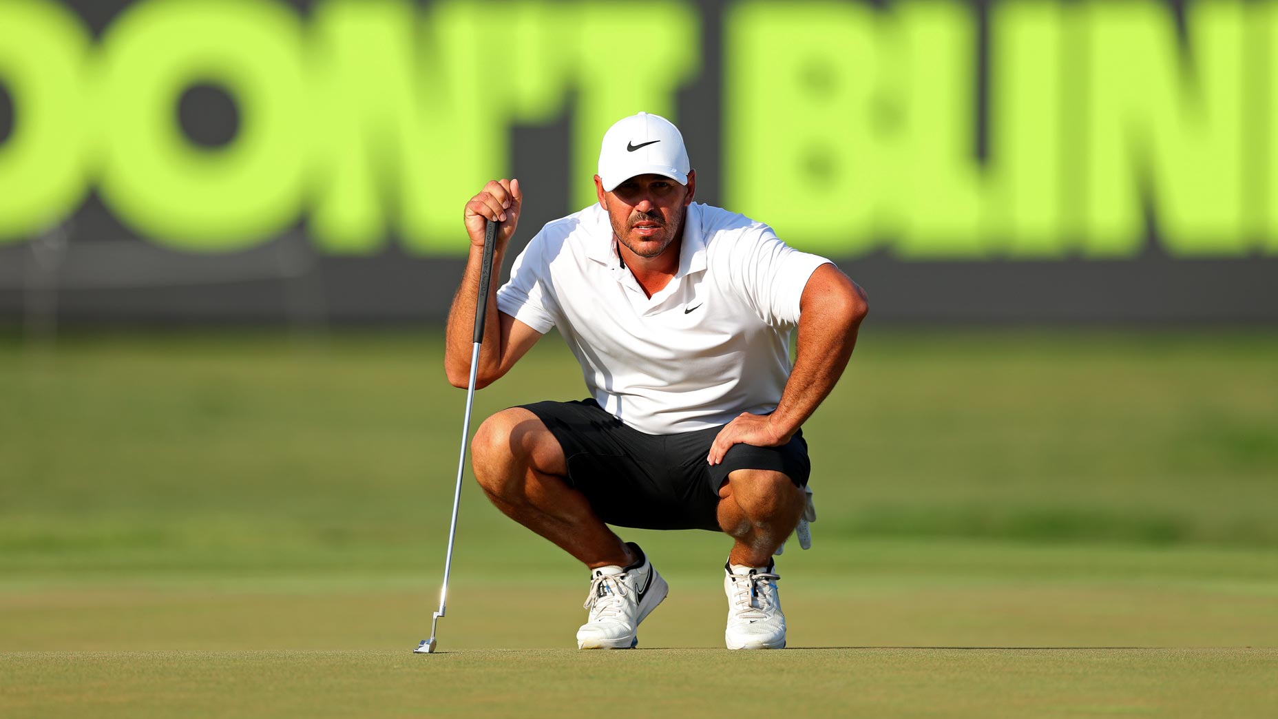 Captain Brooks Koepka of Smash GC lines up a putt on the 18th hole during day three of the LIV Golf Invitational - Orlando at The Orange County National on April 02, 2023 in Orlando, Florida.