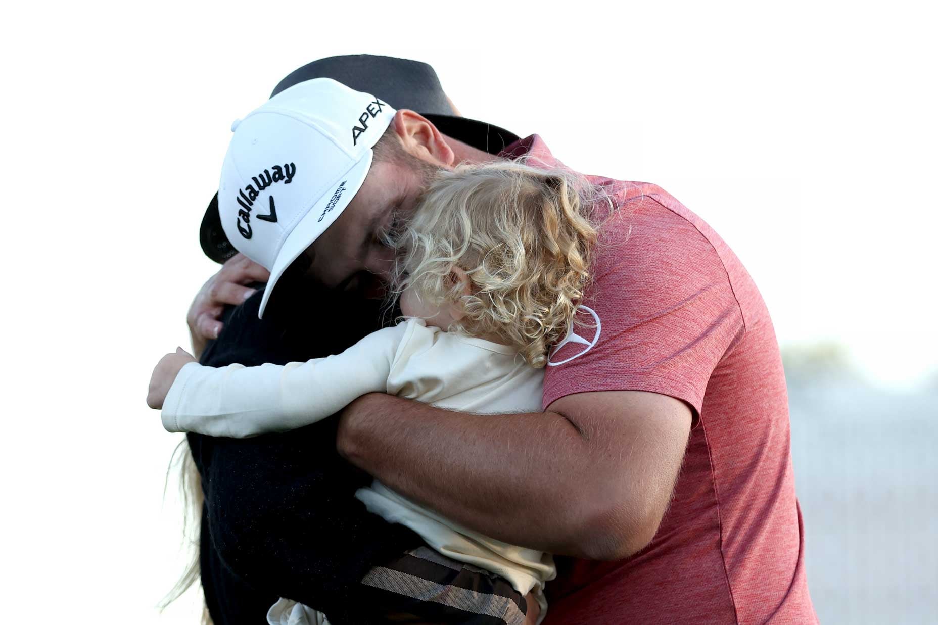 AUGUSTA, GEORGIA - APRIL 09: Jon Rahm of Spain celebrates with his son Kepa Cahill Rahm, and his wife, Kelley, on the 18th green after winning the 2023 Masters Tournament at Augusta National Golf Club on April 09, 2023 in Augusta, Georgia. (Photo by Patrick Smith/Getty Images)