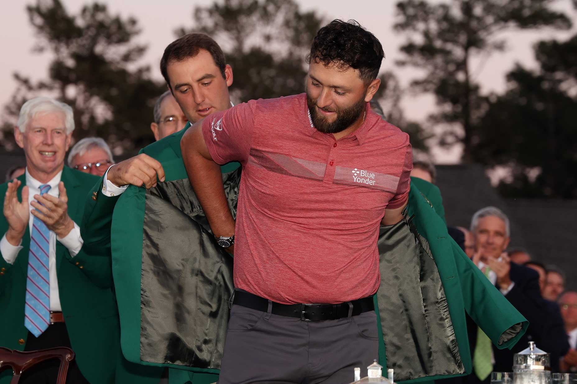 AUGUSTA, GEORGIA - APRIL 09: Jon Rahm of Spain is awarded the Green Jacket by 2022 Masters champion Scottie Scheffler of the United States during the Green Jacket Ceremony after Rahm won the 2023 Masters Tournament at Augusta National Golf Club on April 09, 2023 in Augusta, Georgia. (Photo by Christian Petersen/Getty Images)