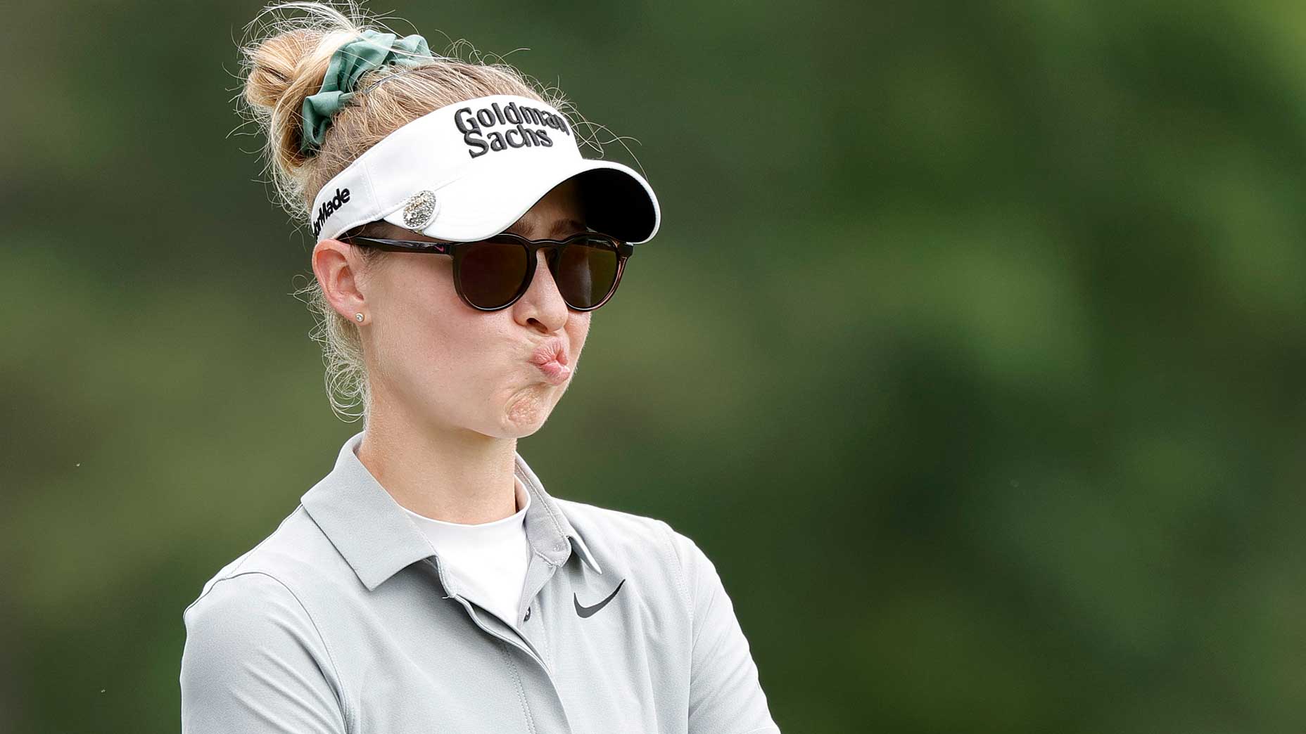 nelly korda bites lip