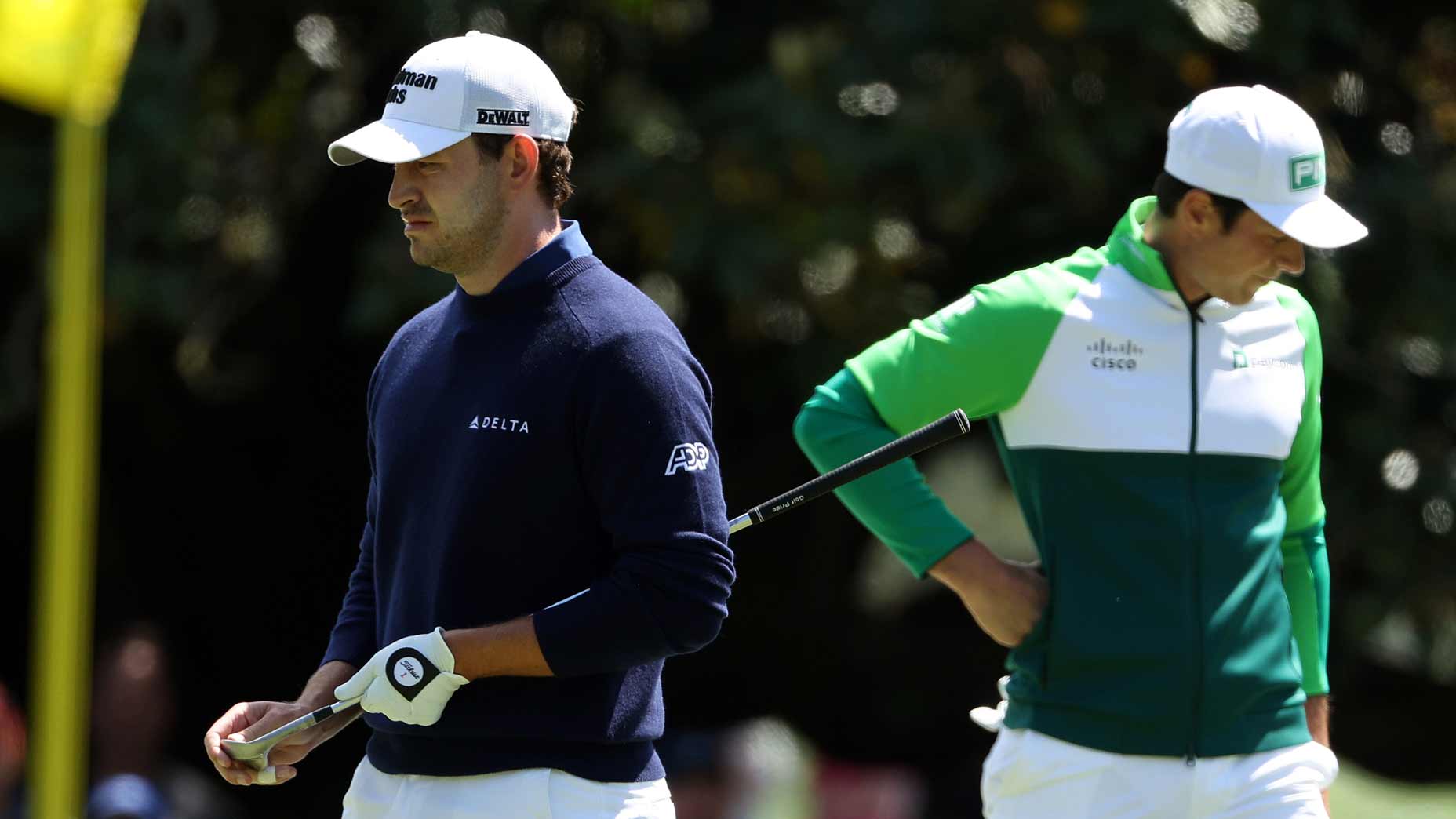 Patrick Cantlay and Viktor Hovland on green at 2023 Masters
