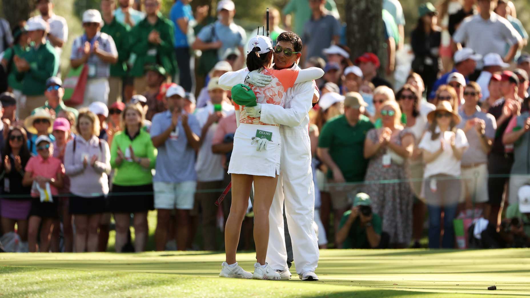 rose zhang hugs her father