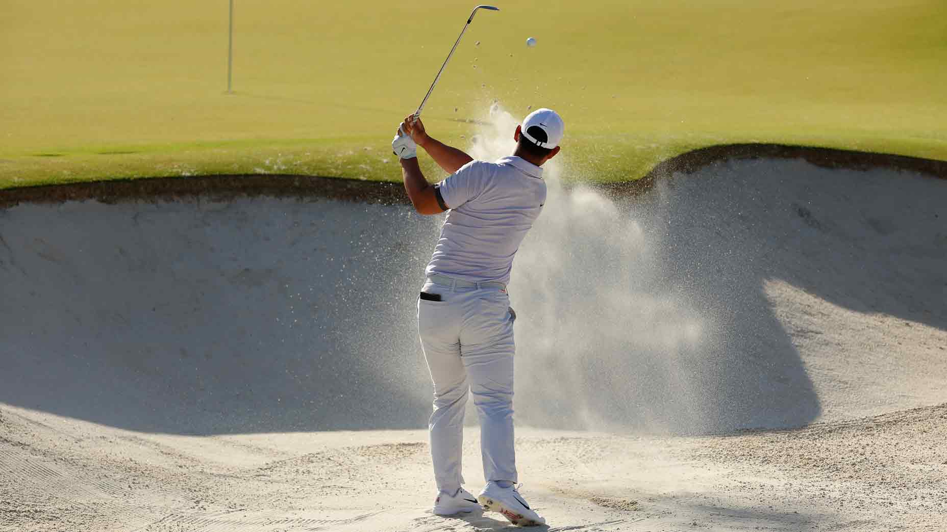 GOLF Top 100 Teacher Kellie Stenzel gives her 10 tips for players to get out of greenside bunkers with more success