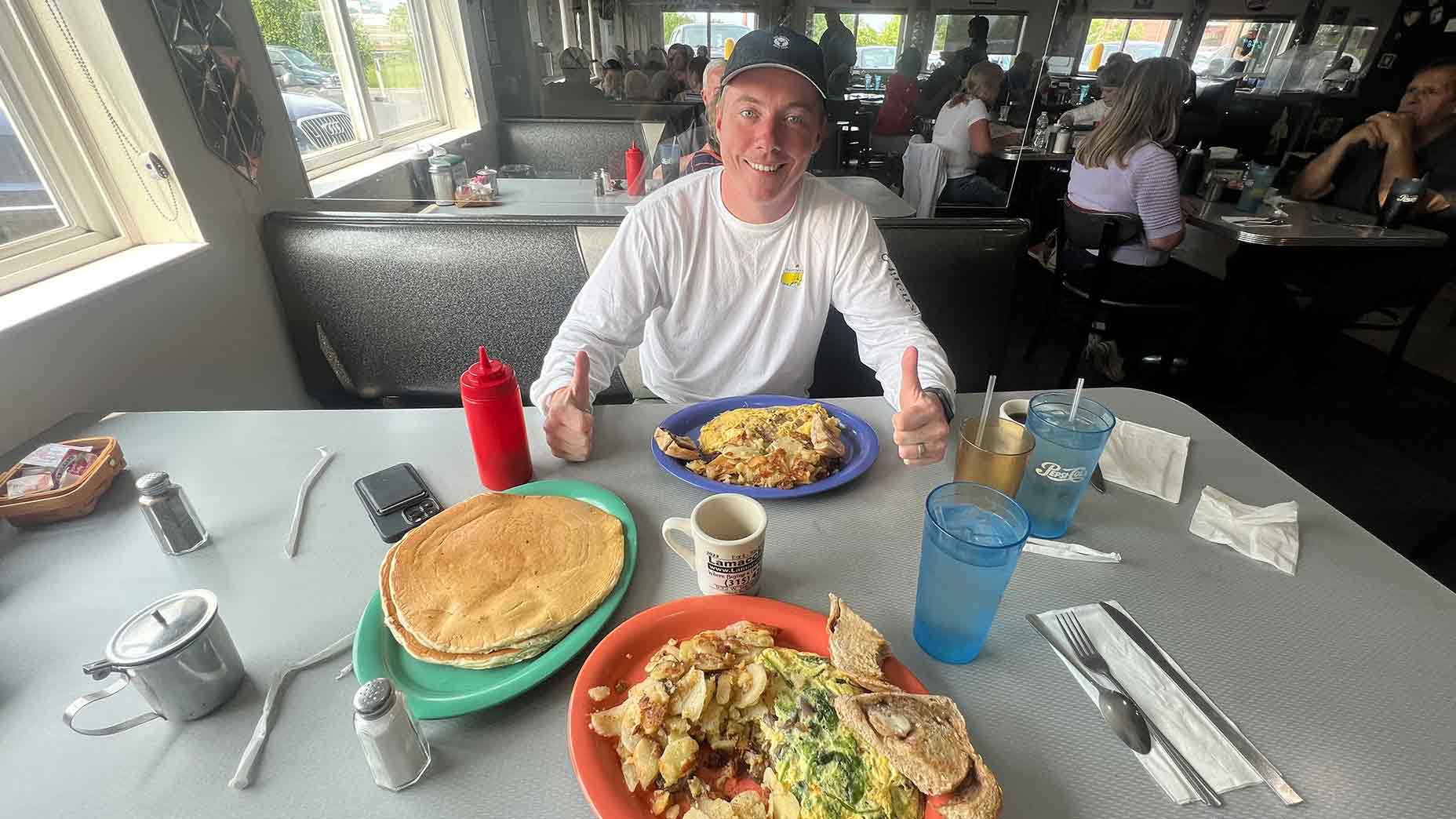 darren riehl poses with pancakes
