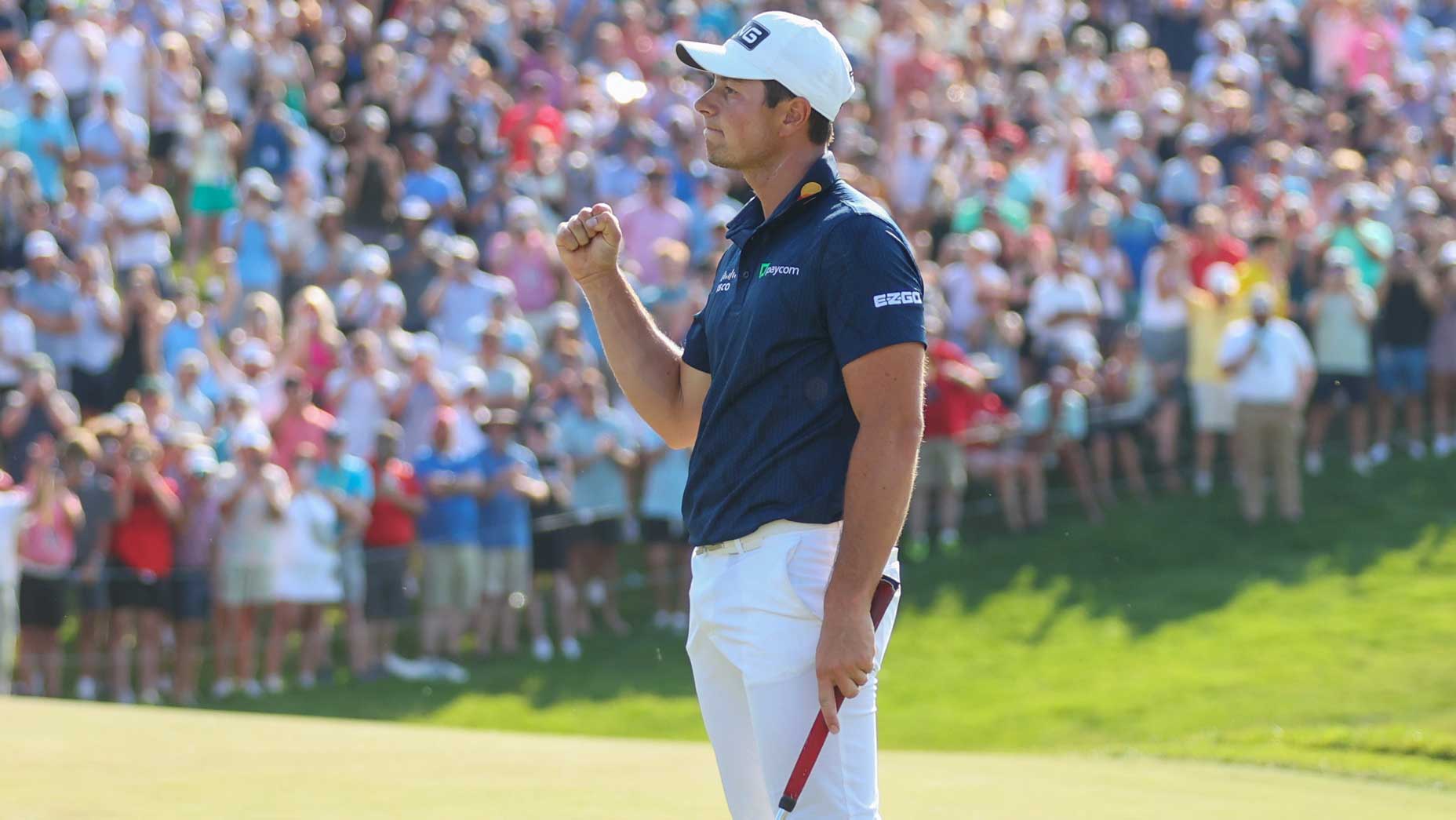 Viktor Hovland of Norway reacts after a making a putt to win in a playoff on the 18th green during the final round of the Memorial Tournament presented by Workday at Muirfield Village Golf Club on June 04, 2023 in Dublin, Ohio.
