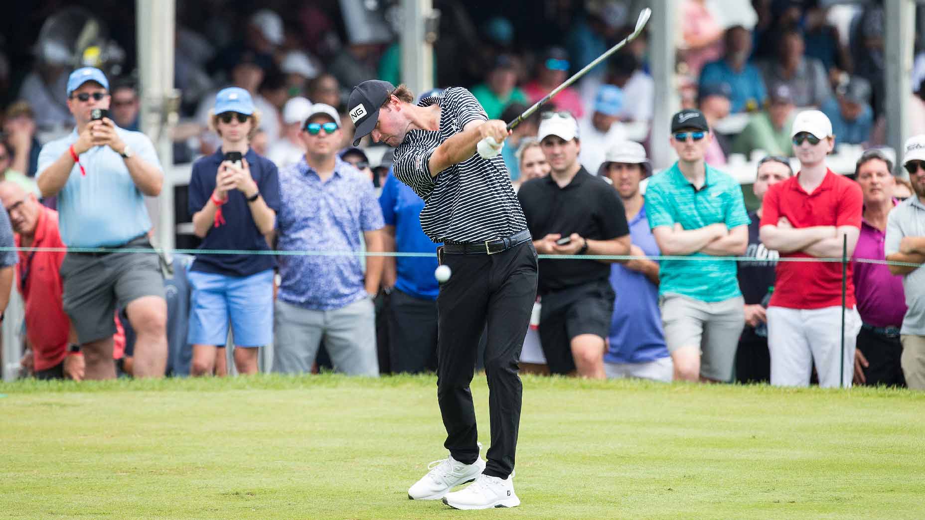 Austin Eckroat hits shot during 2023 Travelers Championship