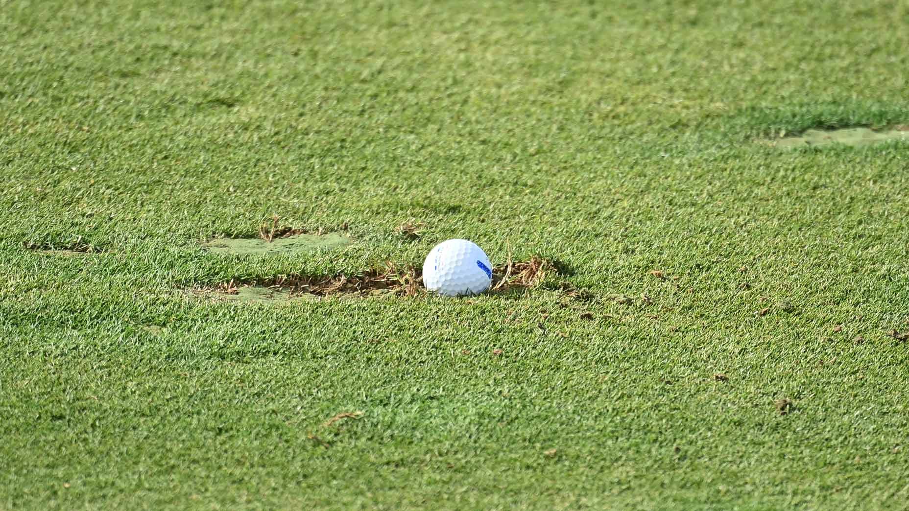How to play a chip shot when your ball is in a divot