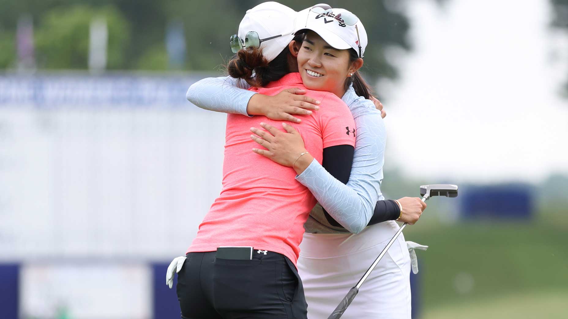 rose zhang and janet lin hug