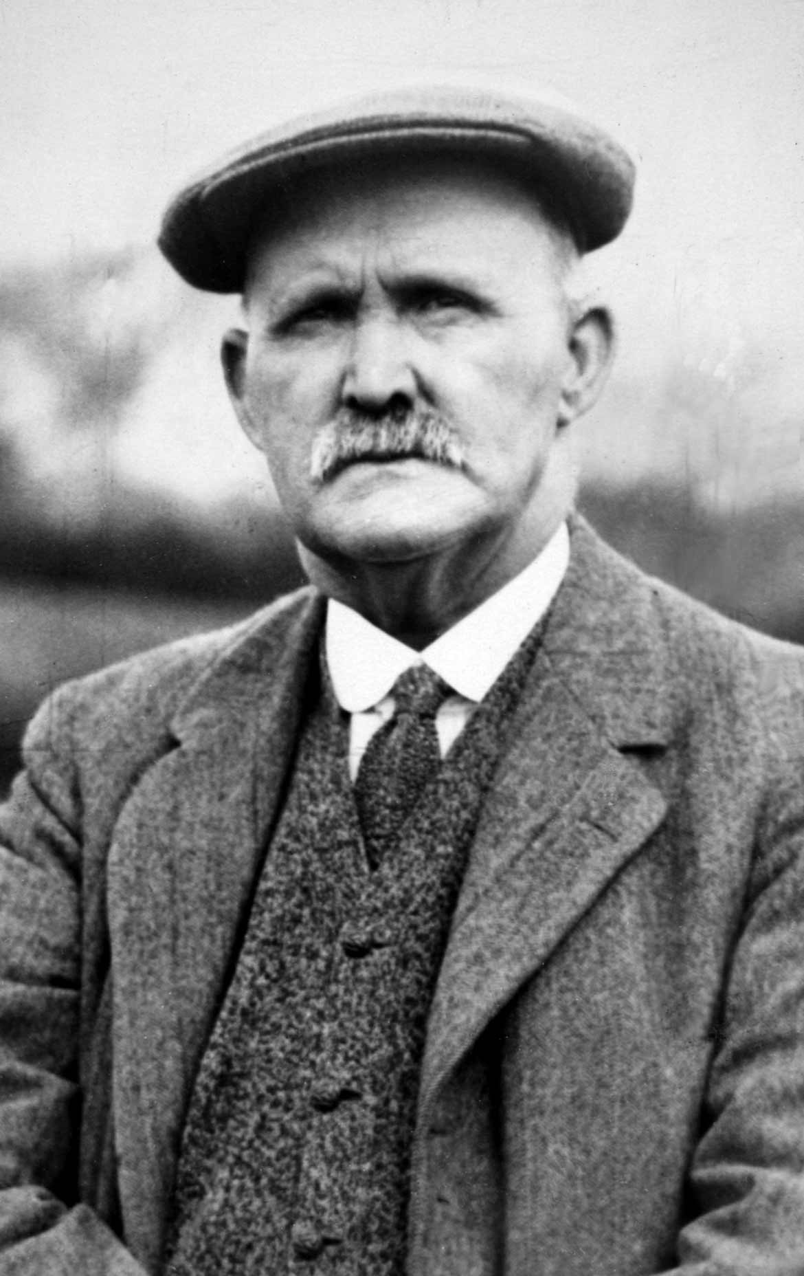 A portrait of J.H. Taylor.