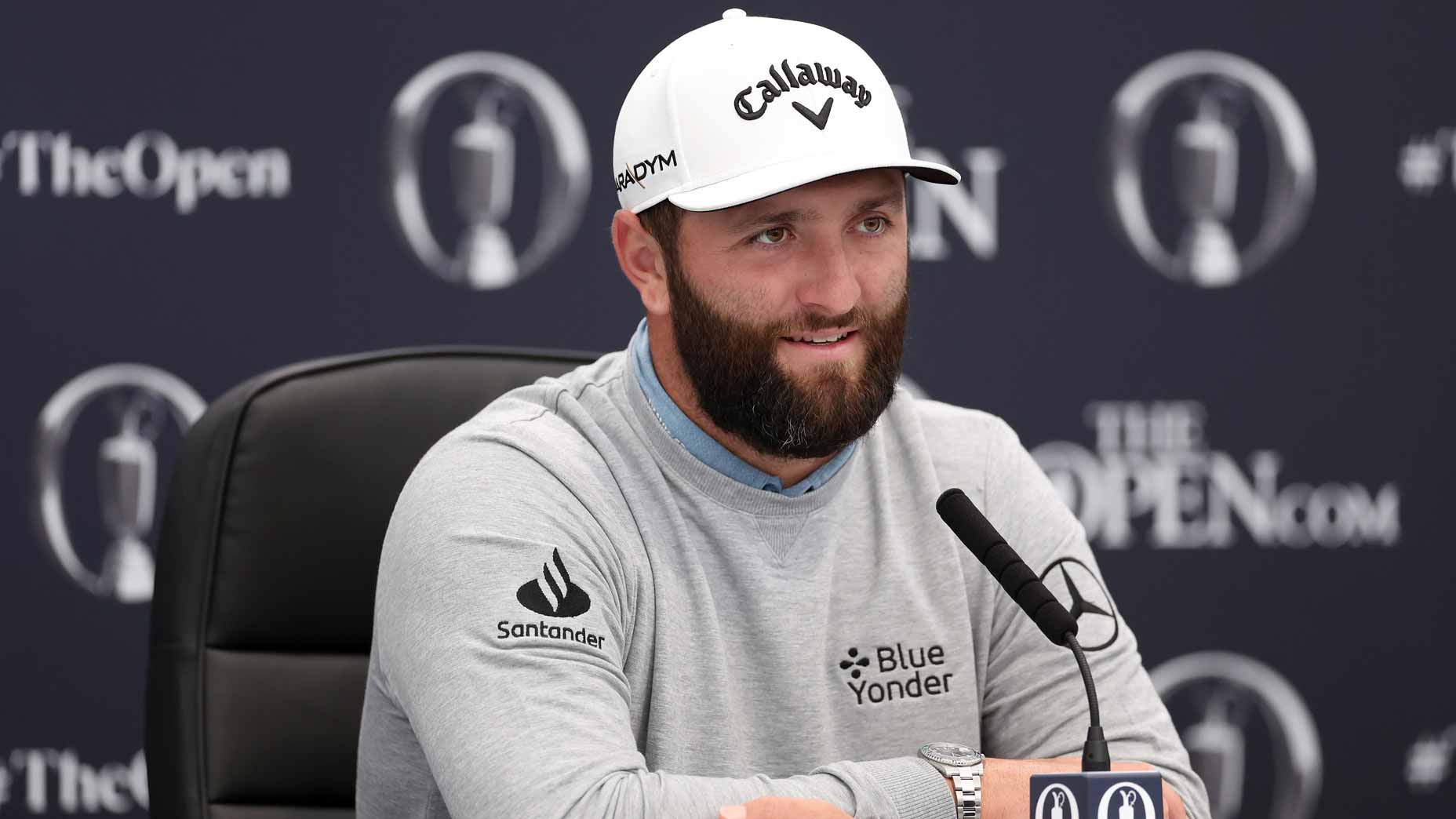 Jon Rahm of Spain speaks to the media during a press conference prior to The 151st Open at Royal Liverpool Golf Club on July 18, 2023 in Hoylake, England.