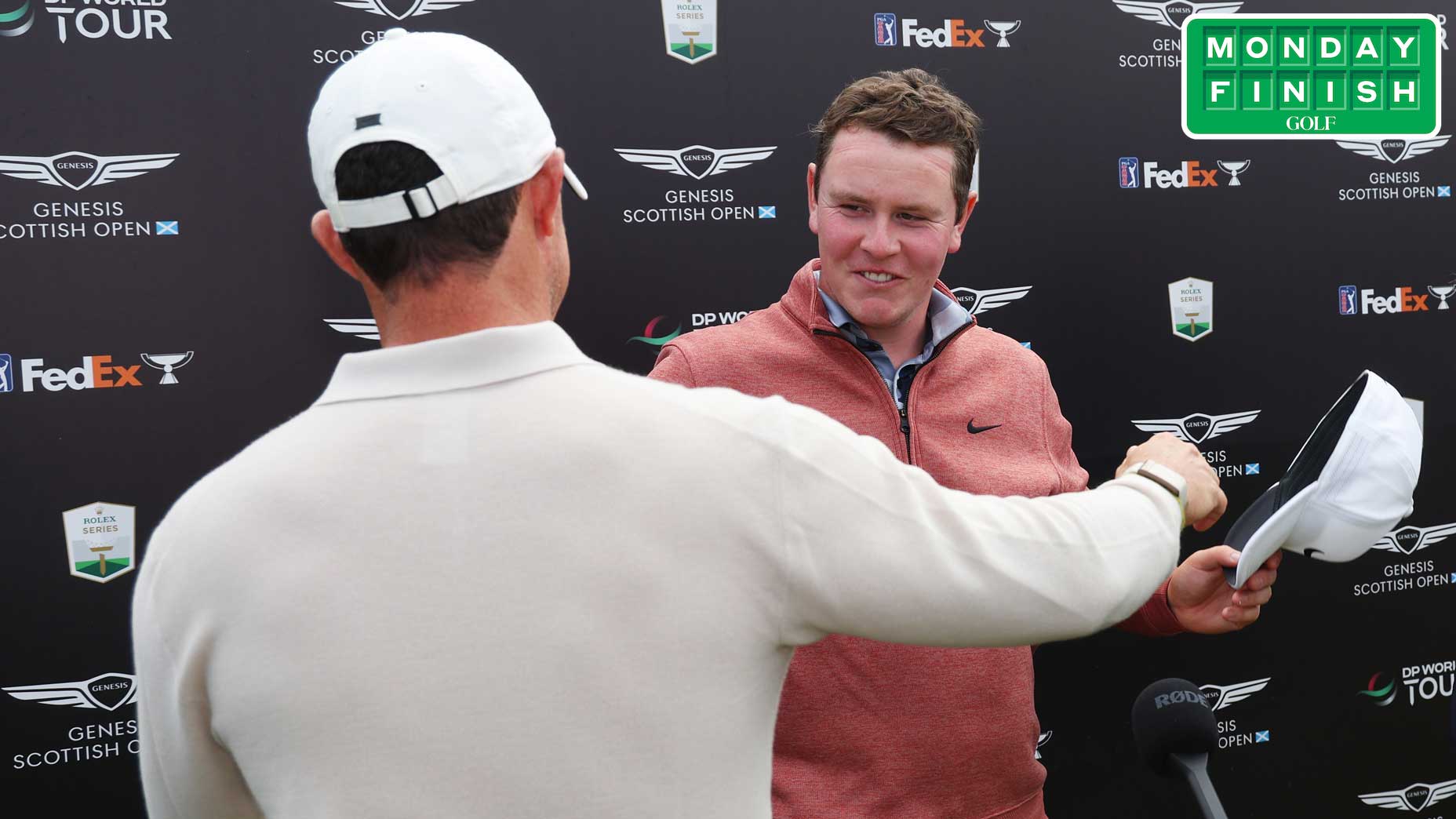 Rory McIlroy and Robert MacIntyre embraced post-round.