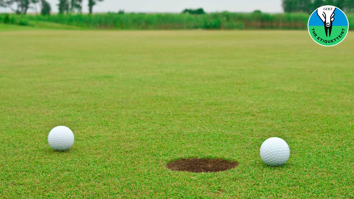 two golf balls on green