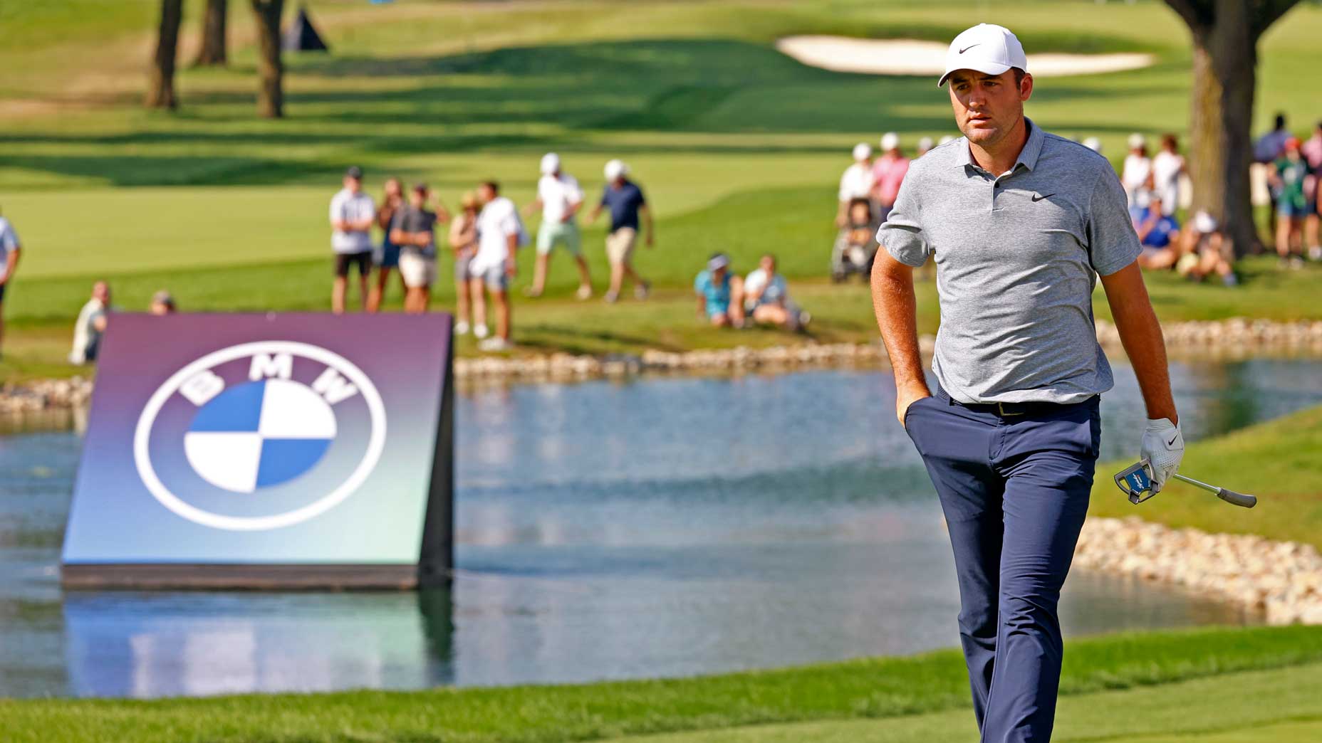 Scottie Scheffler walks the 18th hole during the third round of the BMW Championship Fed Ex Cup Playoffs on August 19th, 2023, at Olympia Fields Country Club in Olympia Fields, Illinois.