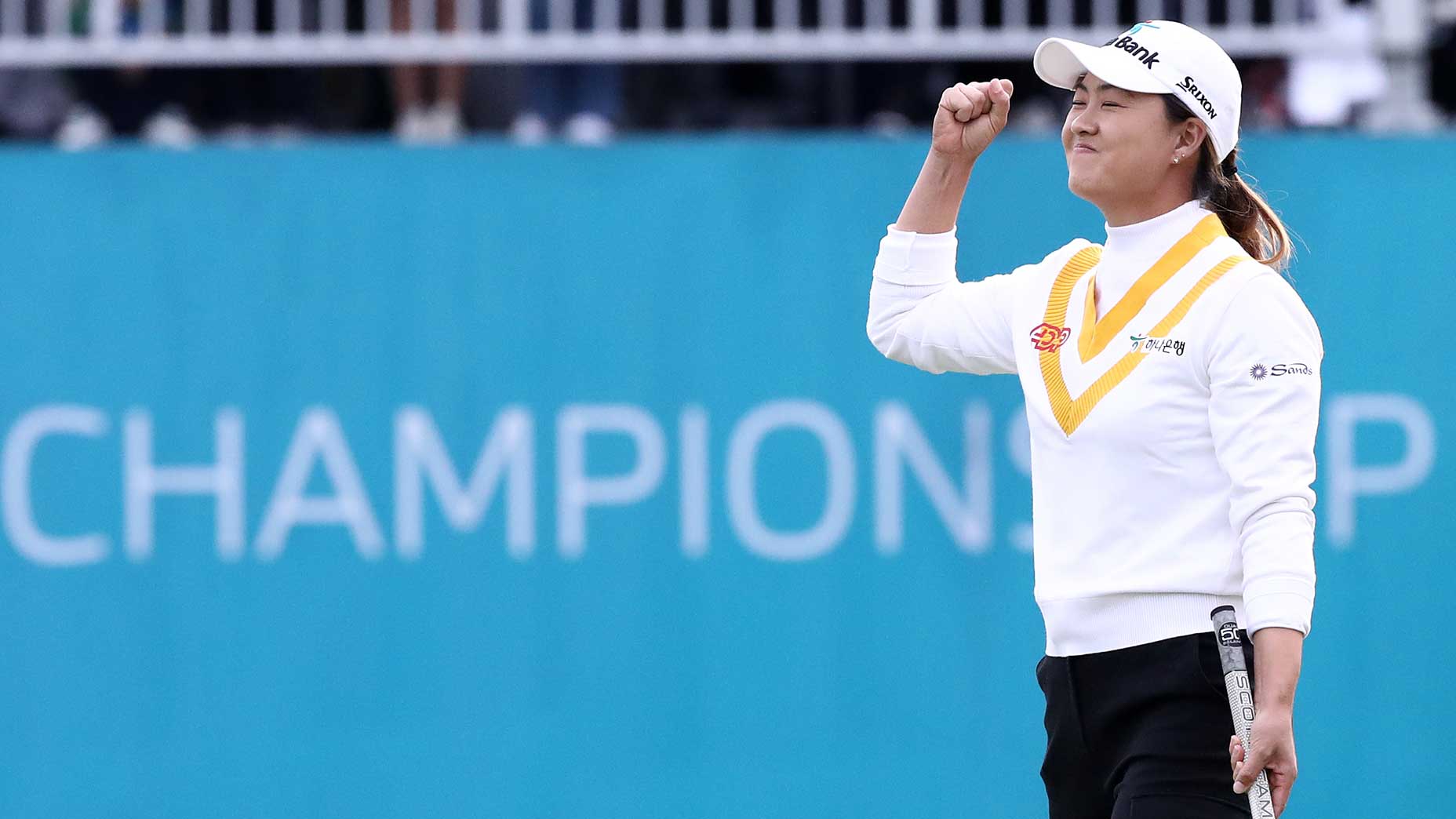 Minjee Lee fist pumps after winning the BMW Ladies Championship.