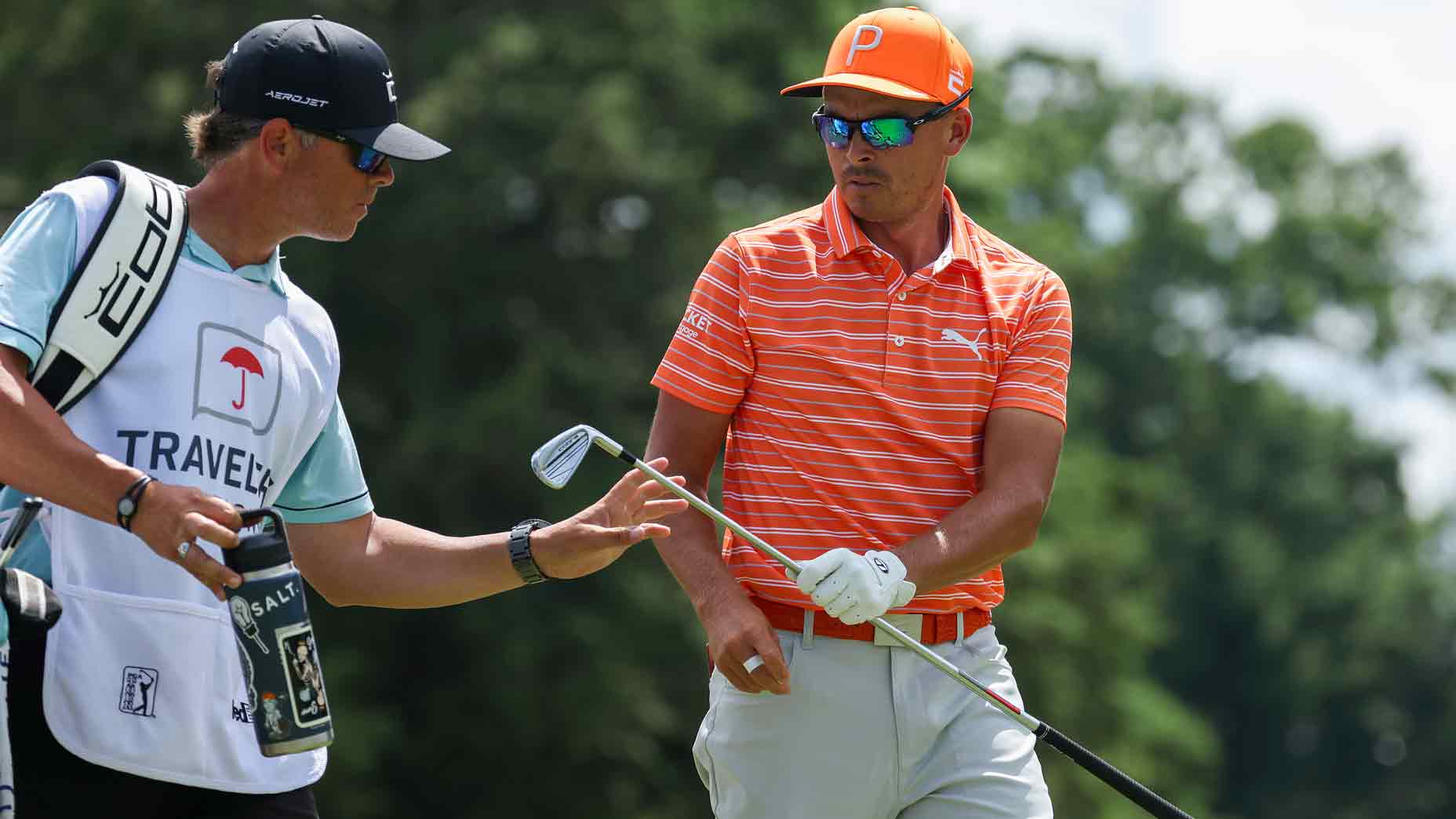 What's it *really* like to caddie for Rickie Fowler? His looper explains