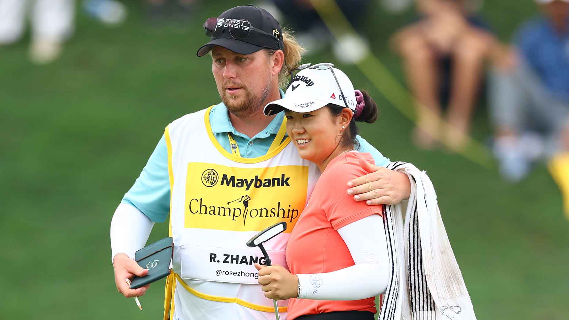 Rose Zhang hugs her caddie at the Maybank Championship