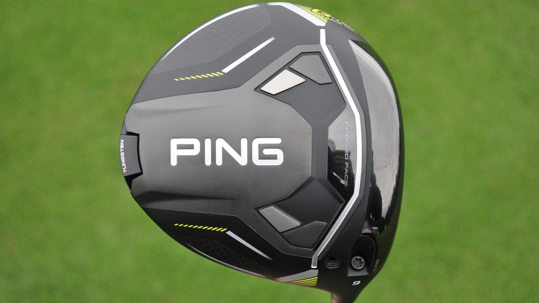 ping g430 max 10k driver against grass background