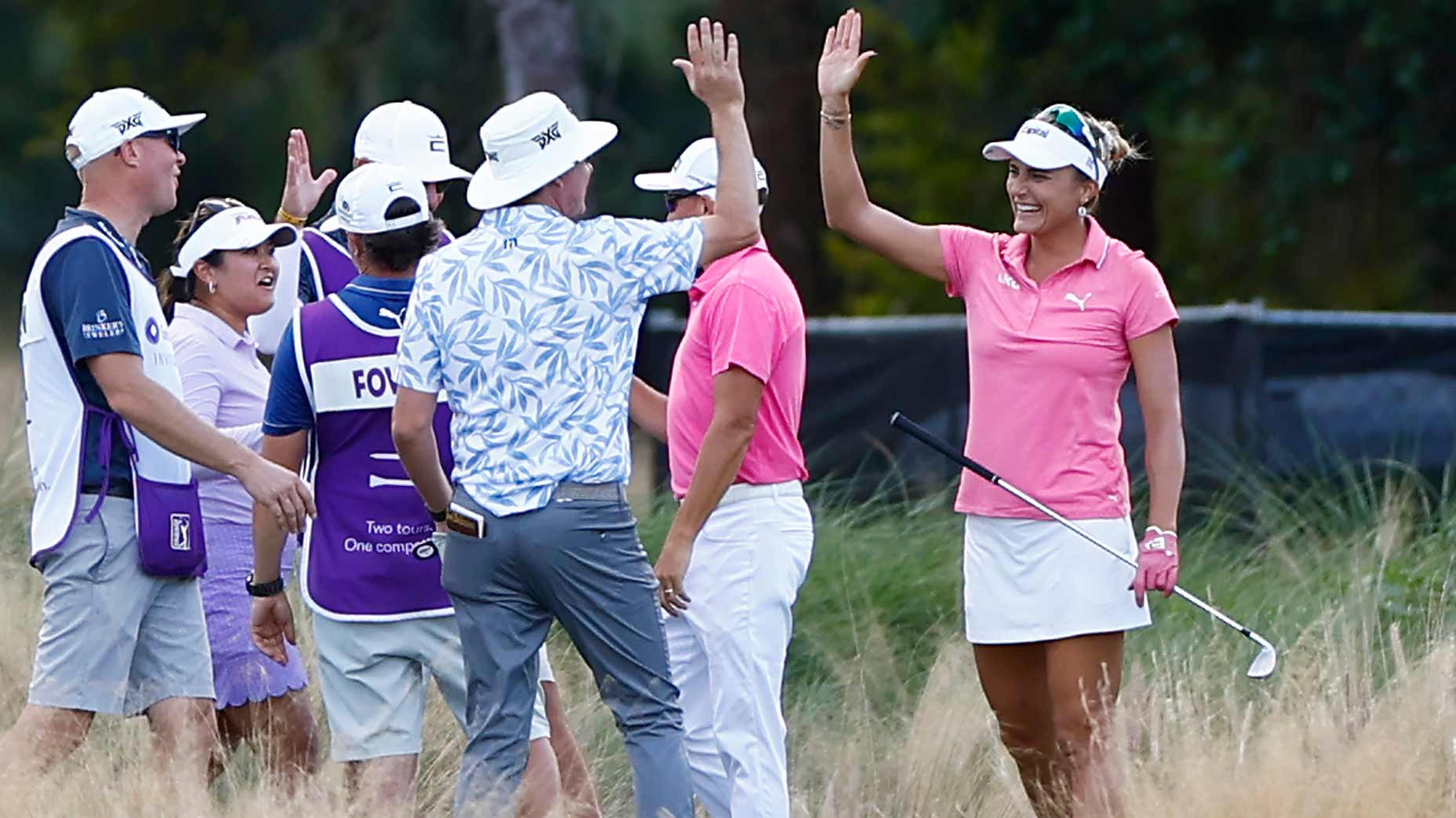 Lexi Thompson high-fives Joel Dahmen at the Grant Thornton Invitational.