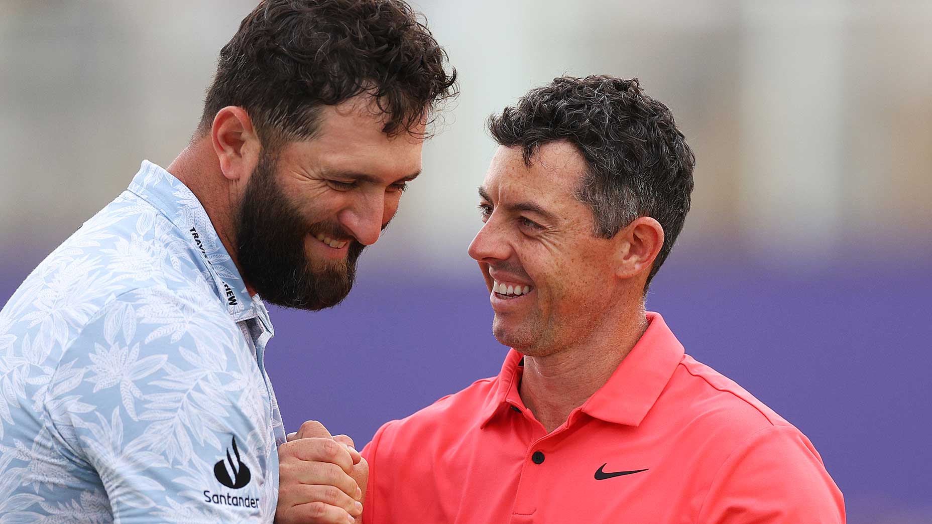 jon rahm and rory mcilroy laugh