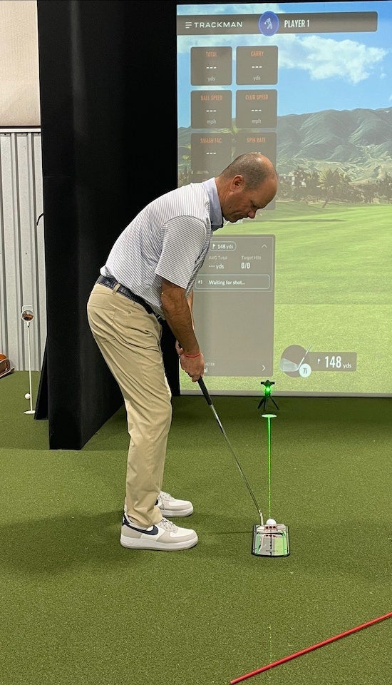 An indoor golf drill focusing on putting