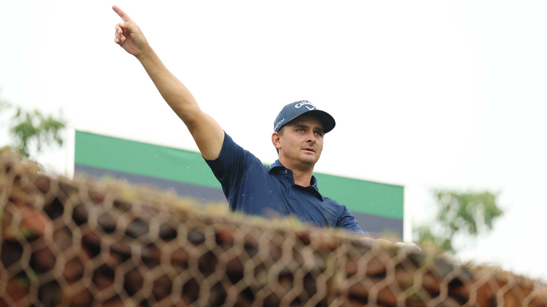 Pro golfer Christiaan Bezuidenhout points from tee at 2023 Alfred Dunhill Championship