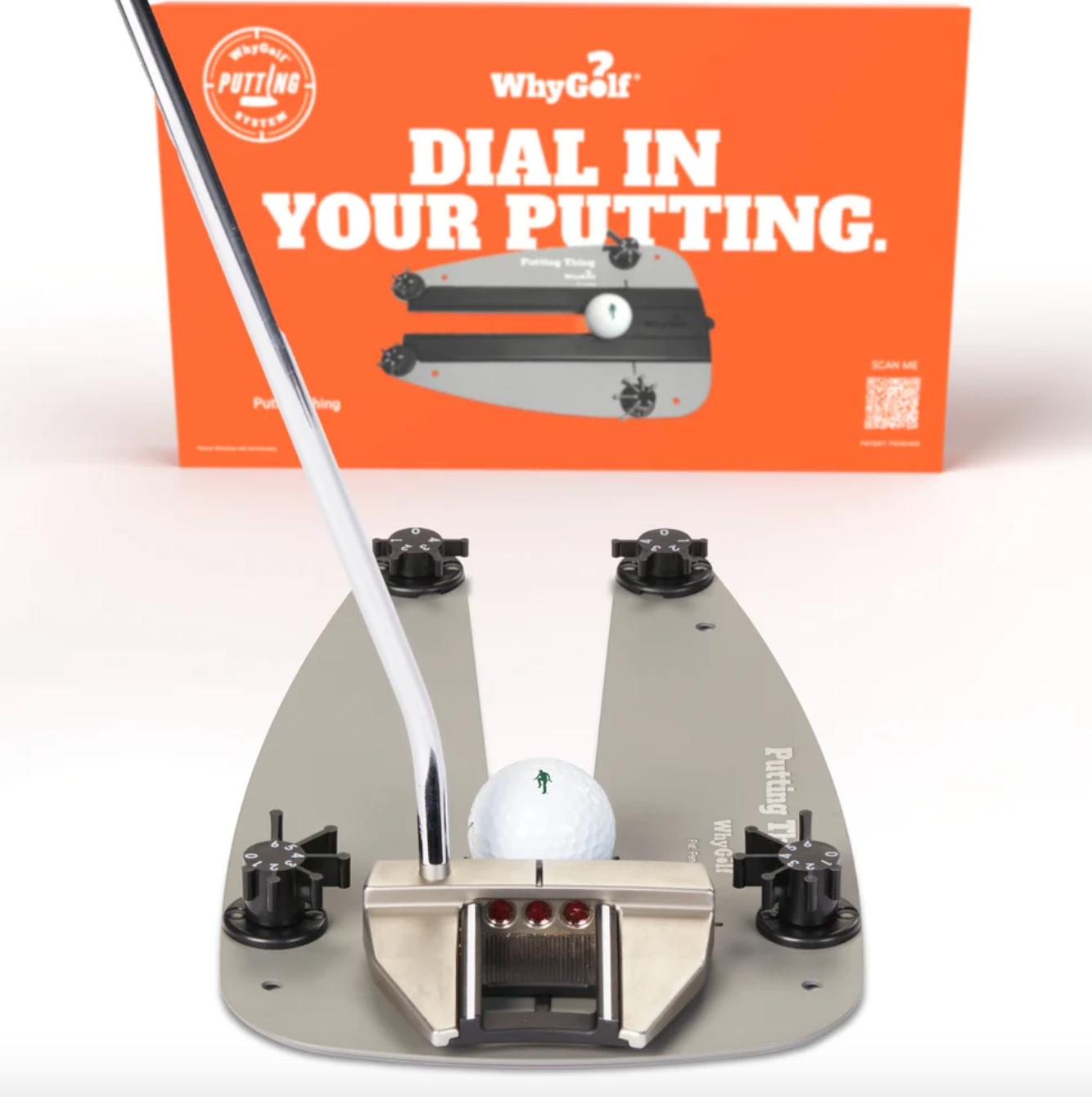 why golf putting thing training aid with putter and ball in the foreground