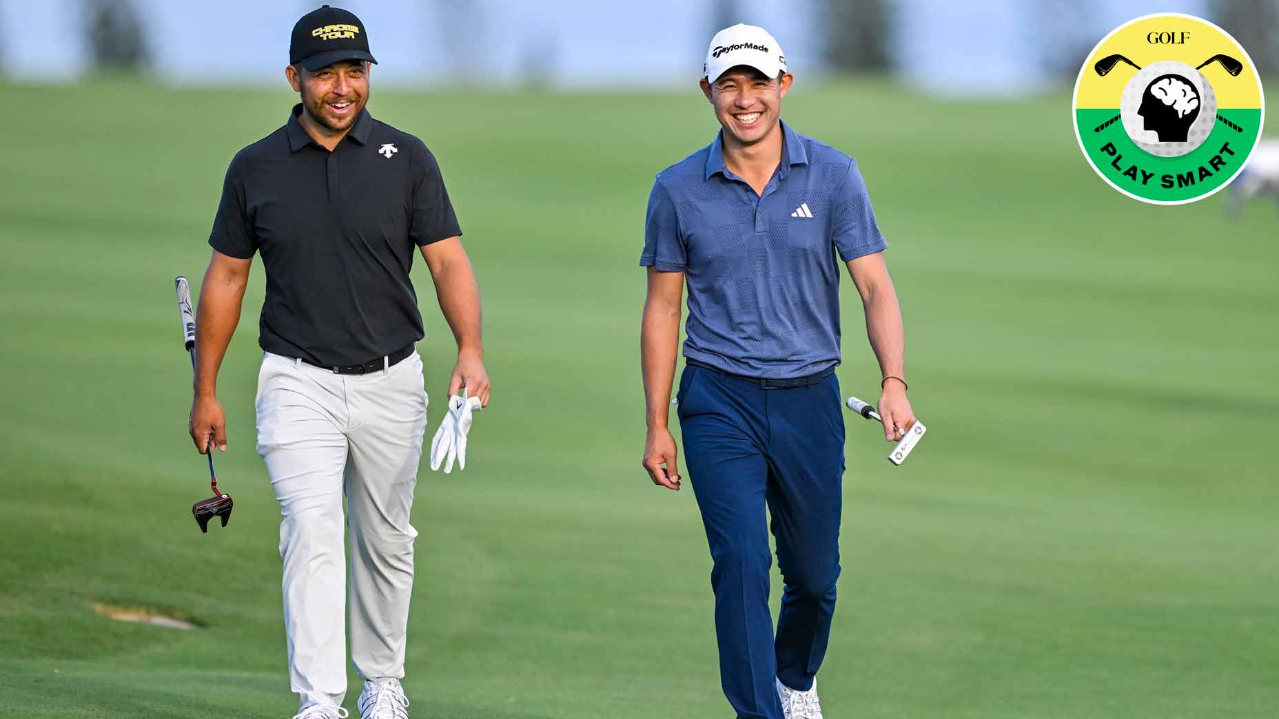collin morikawa walks alongside xander schauffele down the fairway at the 2023 sentry tournament of champions in hawaii
