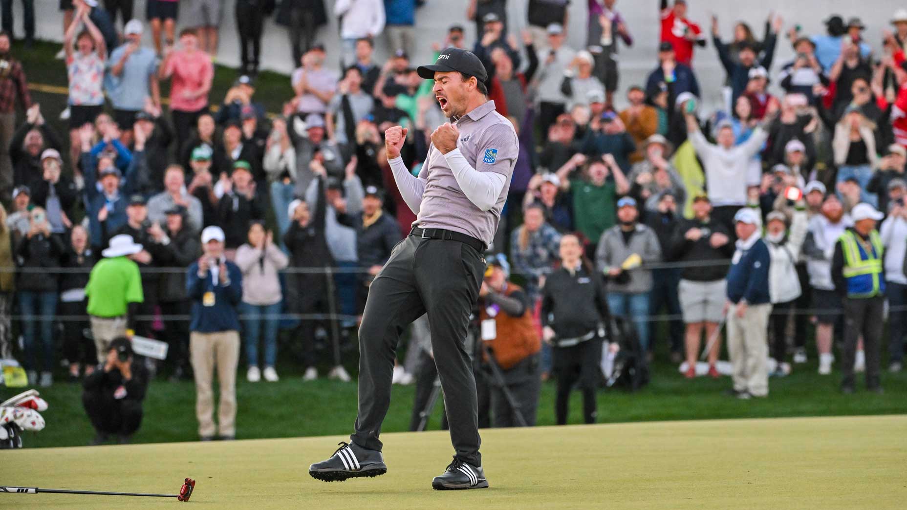 Nick Taylor celebrates winning the WM Phoenix Open.