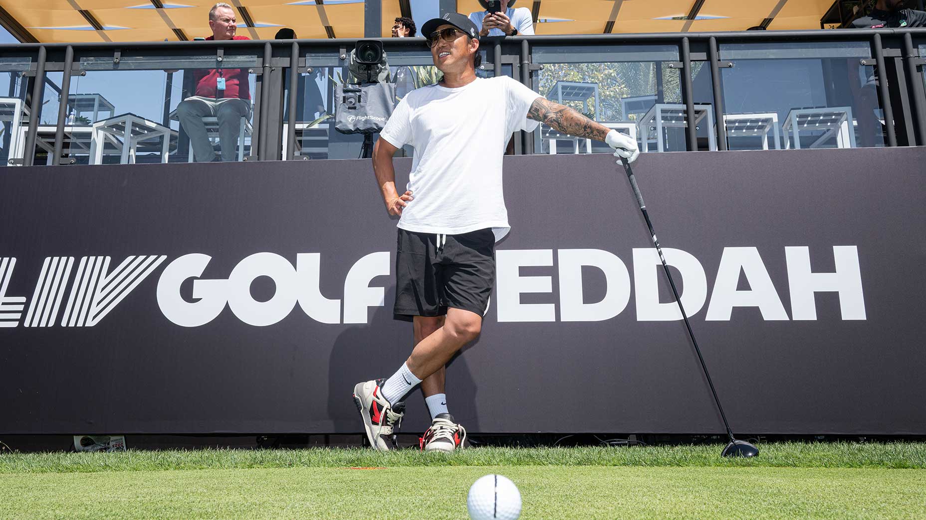 anthony kim waits on the tee during a liv golf practice round