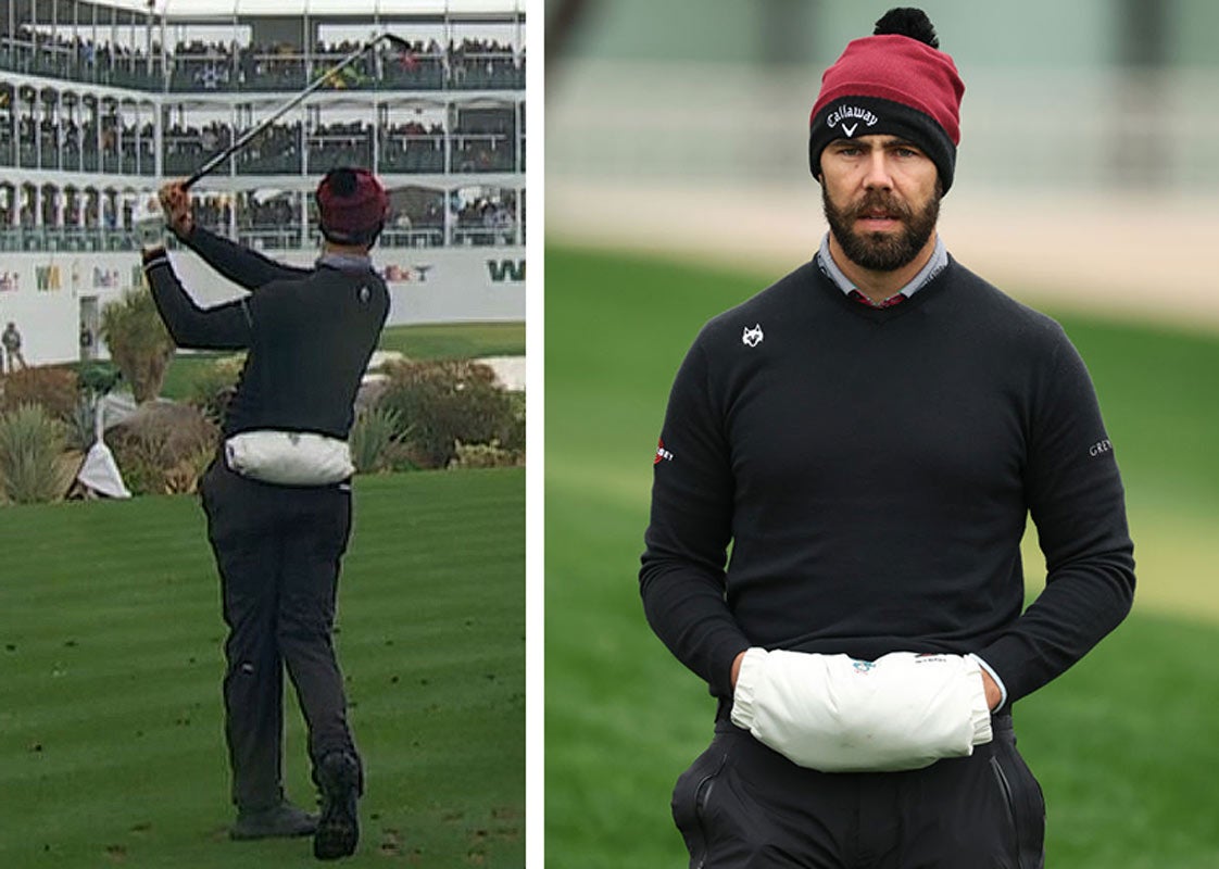 SCOTTSDALE, ARIZONA - FEBRUARY 08: Erik van Rooyen of South Africa looks on as he warms his hands on the first green during the first round of the WM Phoenix Open at TPC Scottsdale on February 08, 2024 in Scottsdale, Arizona. (Photo by Christian Petersen/Getty Images)