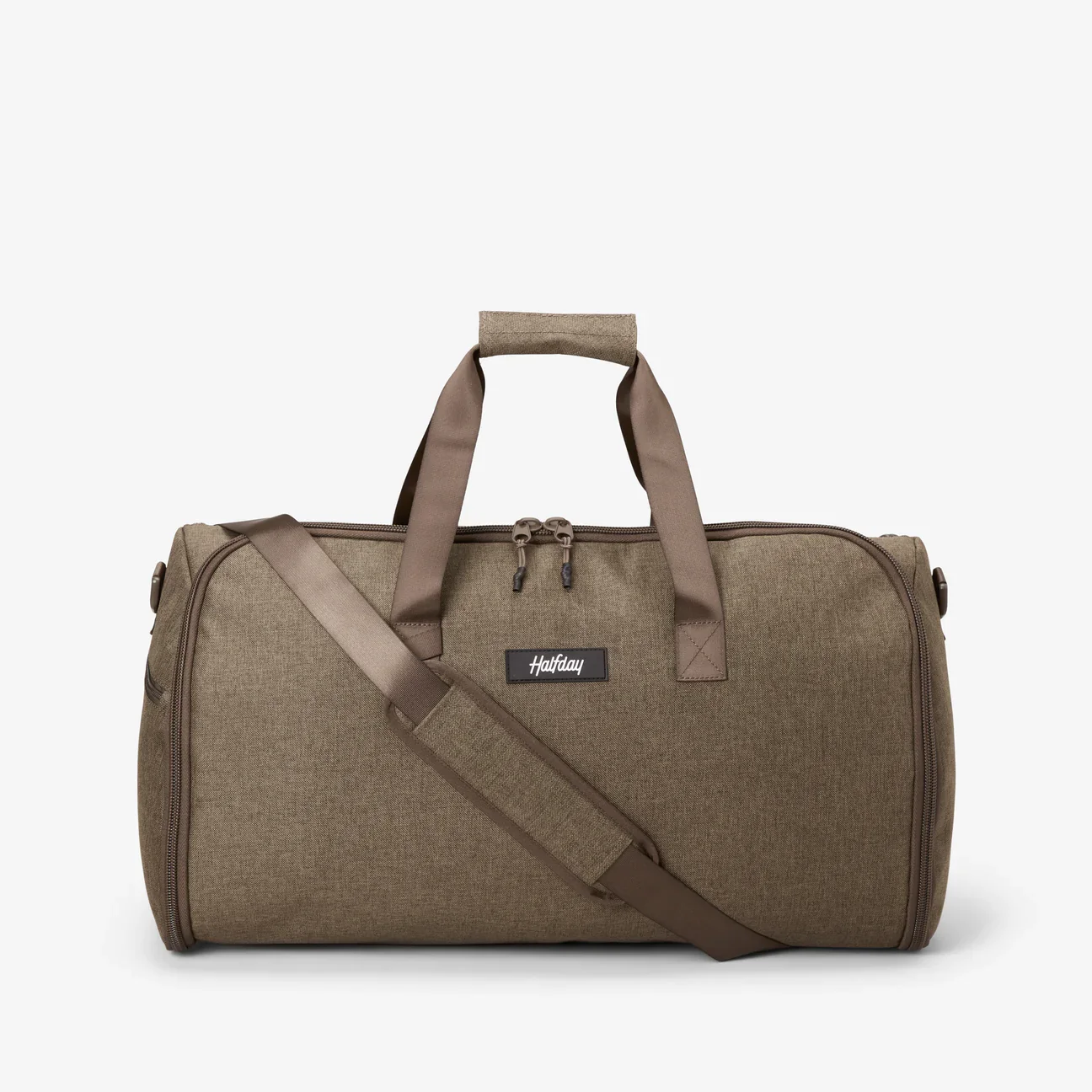 Halfday's Garment Duffel in the color 'dune' which is a subdued brown/tan. It features a strap and doubles as both a garment, duffel and shoe bag for ultimate travel convenience.