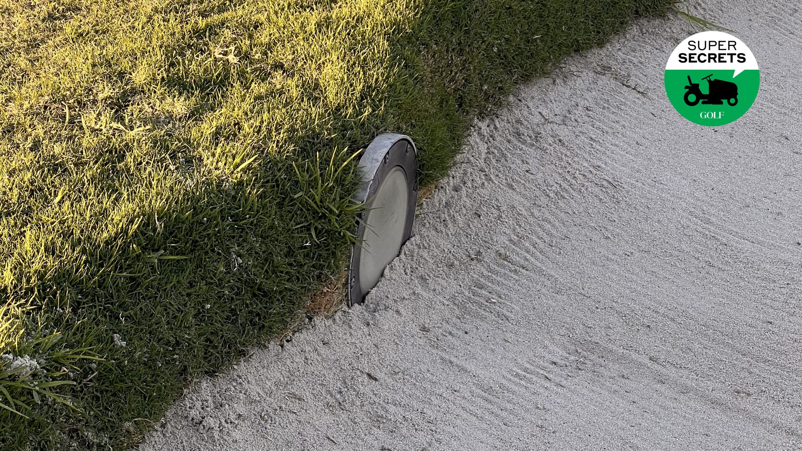 Lights along the bunker edge of the 10th hole at Riviera