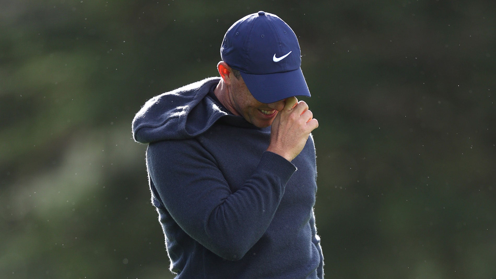 Rory McIlroy of Northern Ireland reatcs during the first round of the AT&T Pebble Beach Pro-Am at Spyglass Hill Golf Course