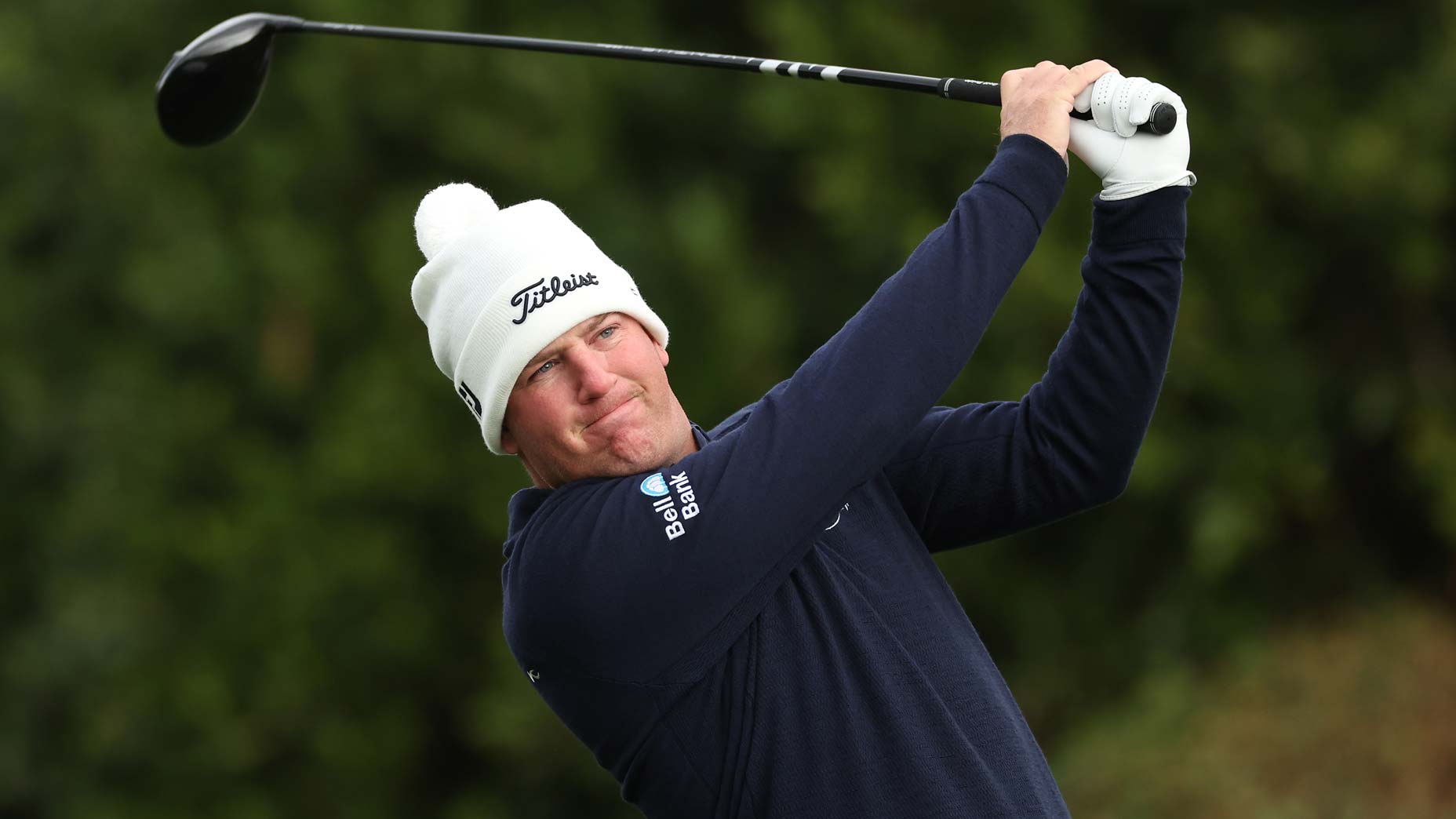 Pro golfer Tom Hoge hits drive at 2024 WM Phoenix Open