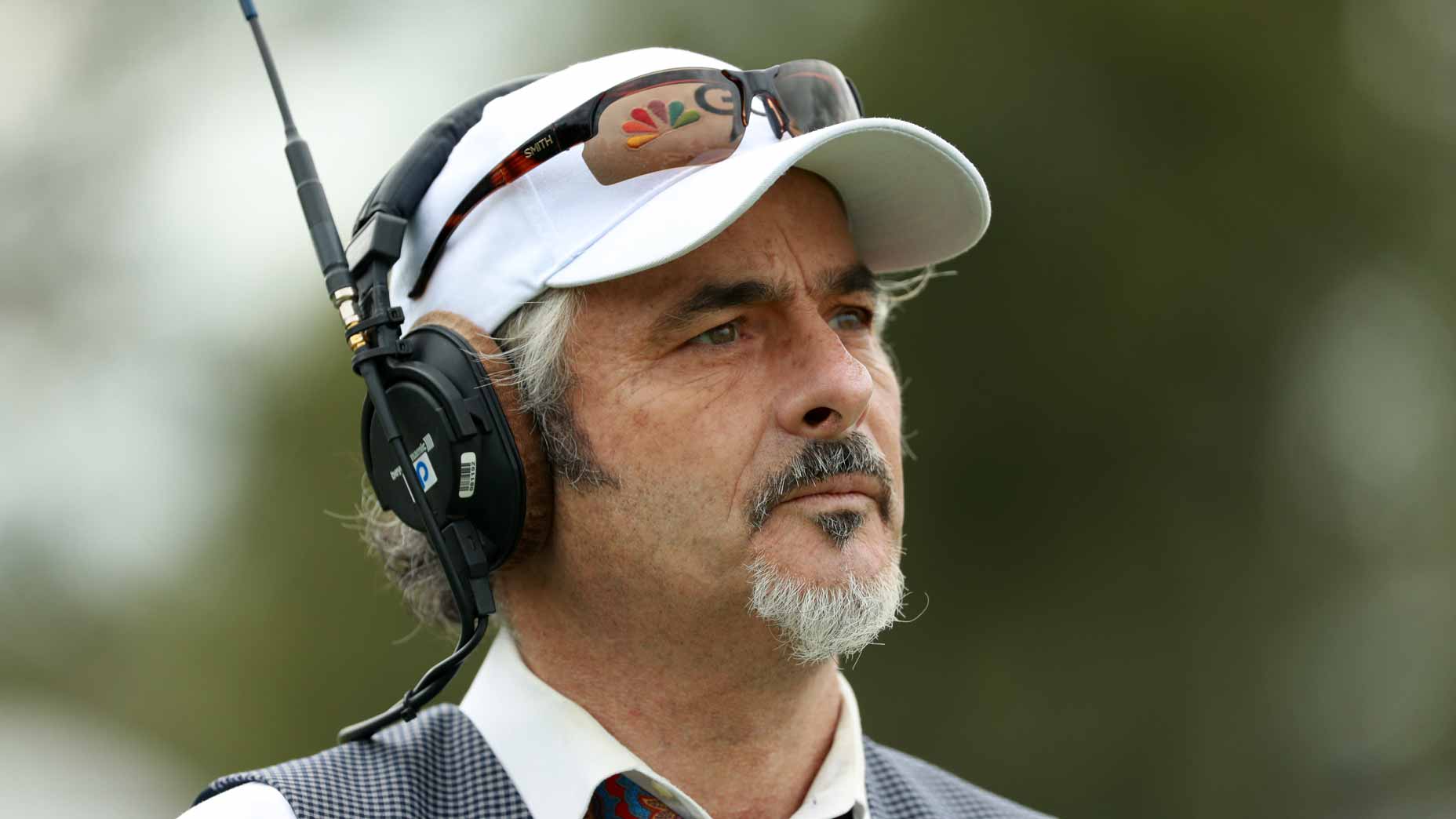 David Feherty with a headset at the 2017 Presidents Cup.