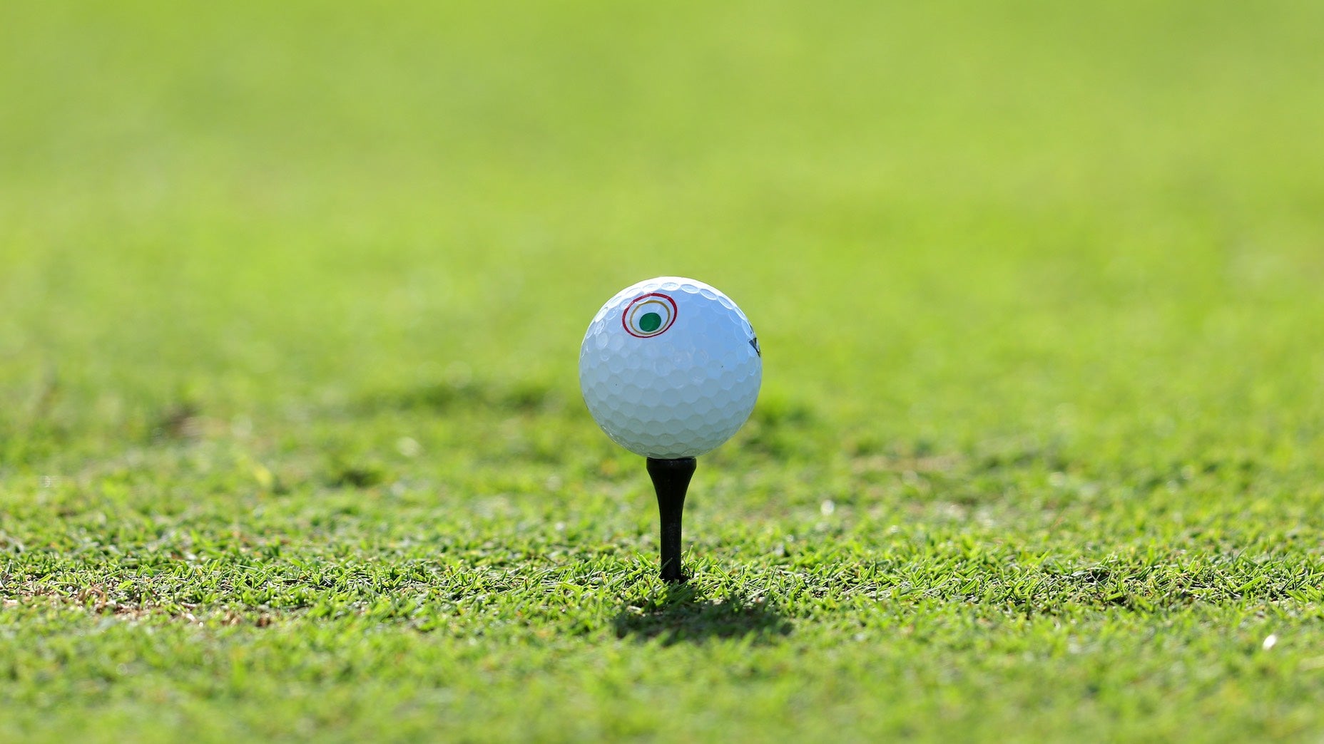 Why Jason Day adds a unique multi-colored design to his golf ball